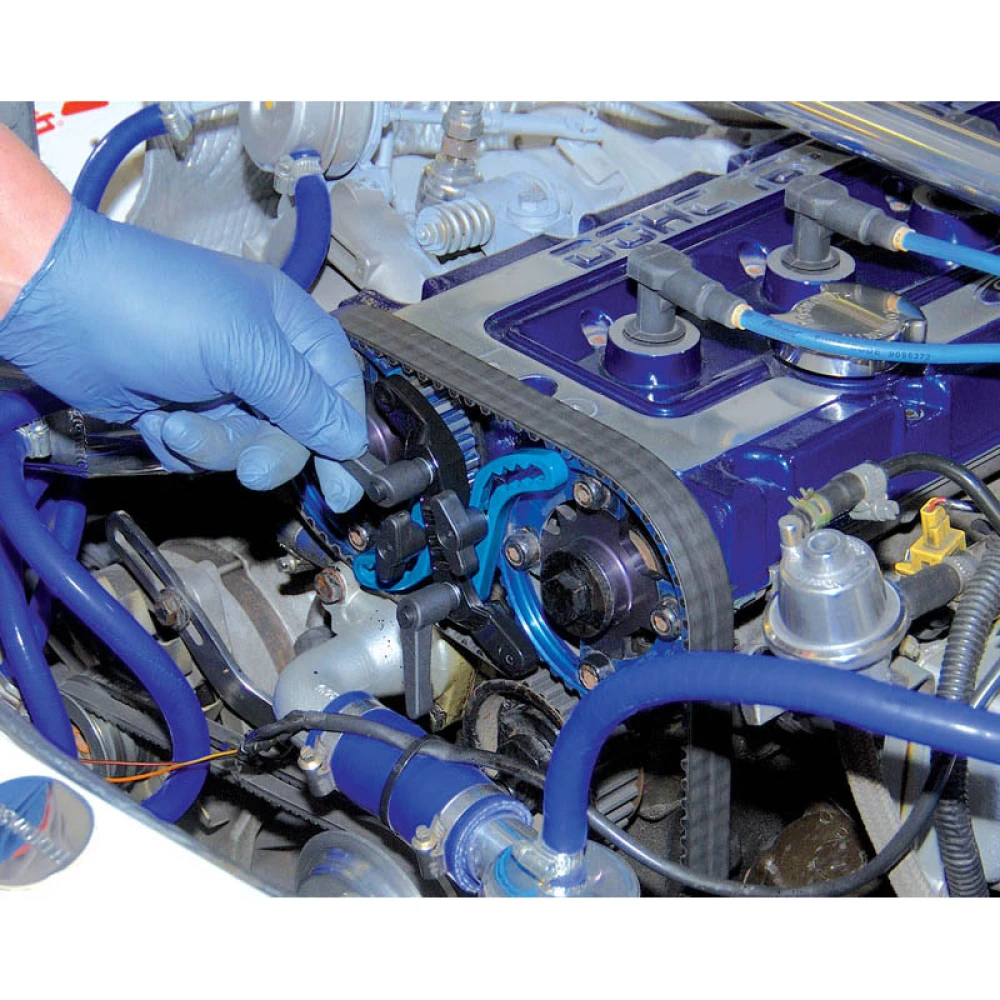 Detalle de brazos ajustables de la herramienta para bloqueo de correa de distribución